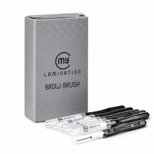 Brosses à sourcils Brow Brush My Lamination avec capuchons transparents devant leur boîte grise.